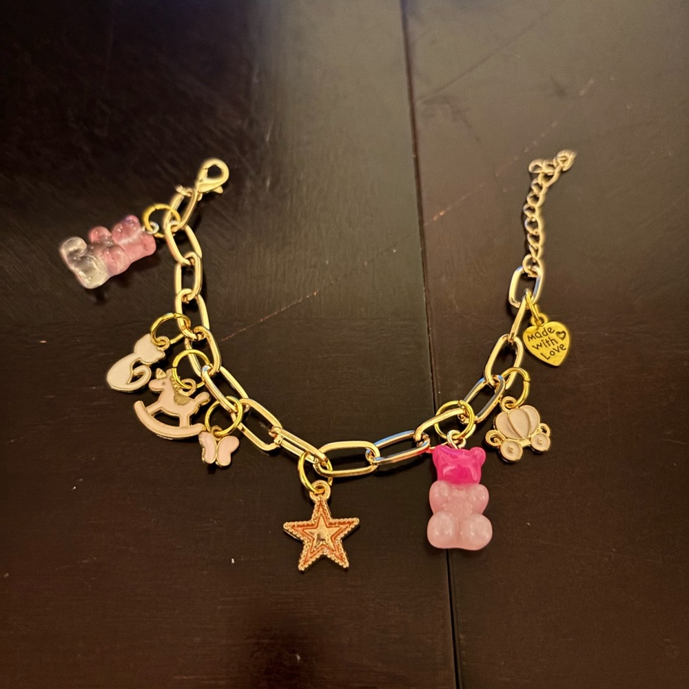 Planet Gold Pink and Gold Charm Bracelet
